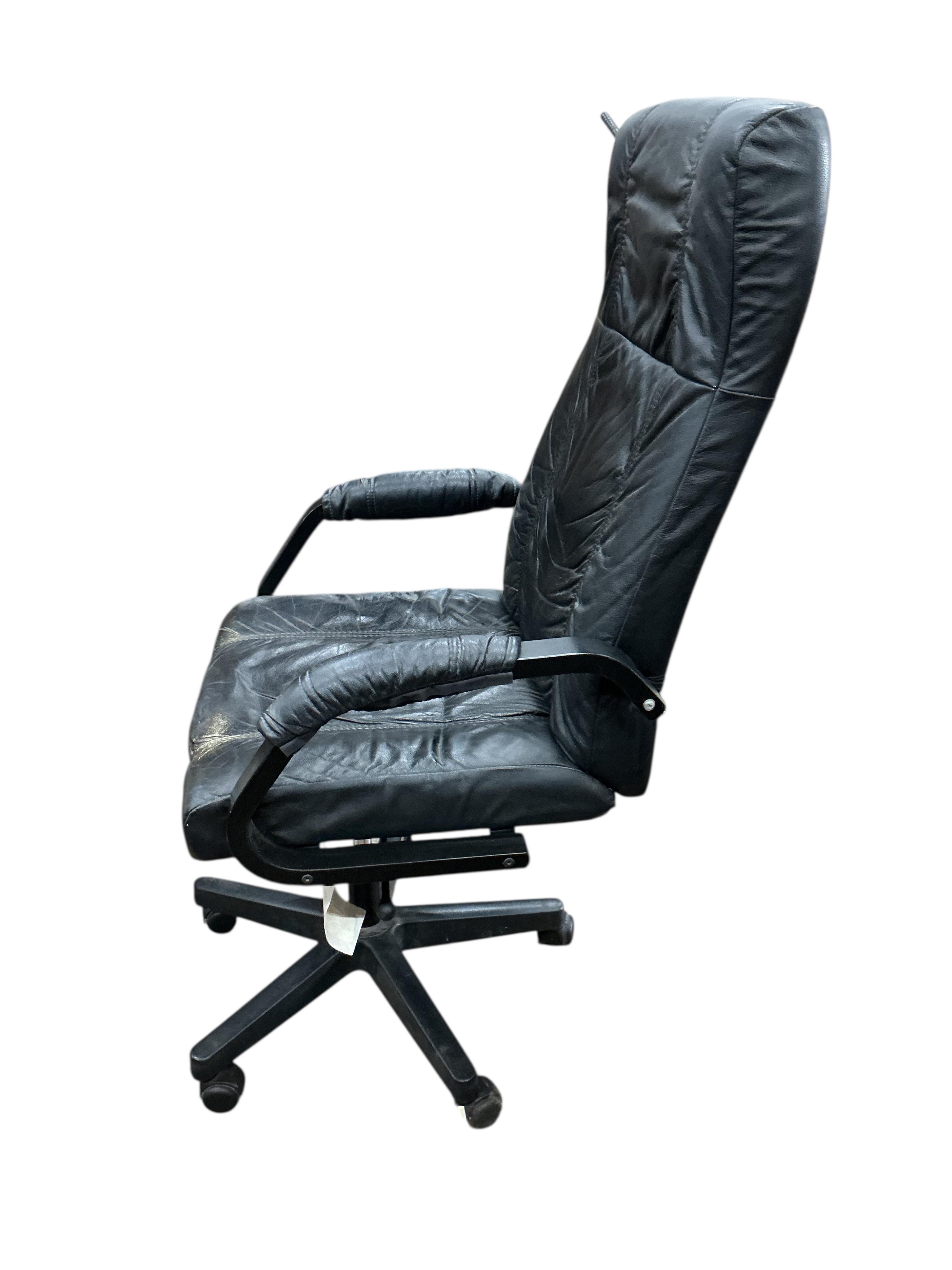 A Danish leather swivel desk chair, width 64cm, depth 58cm, height 122cm
